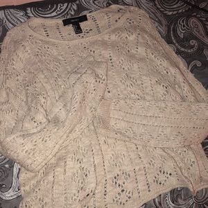 Cropped cream knitted sweater